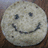 A pixelated circular object with a smiley face on a brown background, paired with purple and gray text reading 'this chip is happy' and 'WHY THE FUCK AREN'T YOU?'
