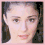 five pixelated facial and text elements: three face sections, lips, and a stylized 'Liz' script on white