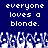 Blue background with white pixelated text reading 'everyone loves a blonde.' repeated twice, and a of abstract white shapes below