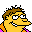 Pixelated cartoon character with yellow skin, brown hair, and glasses wears green crown over orange shirt; three of identical figures on gray background