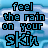A static image displays repeated text 'feel the rain on your skin' in black pixelated font over a blue and white cloud-patterned background.