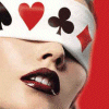 A close-up of a person's lower face with dark red lips, wearing a white headband featuring playing card suits on a red background.