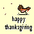 Pixel art of a turkey on a stand with scattered brown pixels, below which reads 'happy thanksgiving' in pixelated text.