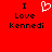 Red background with black text reading "I Love Kennedi" and a white pixelated heart symbol above the word "Love."