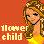 Pixelated image of a smiling figure with long brown hair wearing a yellow top and floral crown against an orange background, with text reading 'flower child' in light-colored block letters.