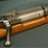 A pixelated image shows a brown and white object with metallic accents against a muted background.