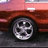 Red car wheel with silver alloy rim shown in three , each displaying a slightly different angle of the same vehicle section