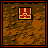 Pixel art icon with a central red and orange symbol on brown textured background, framed by black and red border.