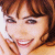 A pixelated image of a person with brown hair holding a phone to their ear, next to green text reading 'Original Icons .com' on a dark background.
