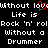 Pixelated text displays 'Without love Life is Rock 'n' roll Without a Drummer' with red heart symbol over 'love', repeated in mirrored layout on black background.
