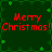 Green background with pixelated clover patterns and red text reading "Merry Christmas!!" in two