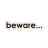 Static image with four quadrants: top-left white background with 'beware...' text, top-right black background with 'something scary is about to come on the screen' text, bottom-left dark cat face with blue eyes, bottom-right solid gray background.