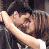 Static 49x49 pixel icon showing a close-up of two people kissing with dark hair and light skin tones, rendered in low-resolution pixel art style with visible dithering and color blending.