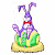 Pixelated bunny with purple ears and body, red bow tie, green patterned torso, yellow base, standing on white background next to dark green text.