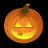 Pixelated orange pumpkin with carved triangular eyes and a wide smiling mouth, glowing yellow interior, brown stem on top against black background.