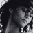 Static grayscale 48x48 pixel icon showing a partial face with dark hair and light skin tones, rendered in low-resolution dithering style.