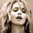 Static 48x48 pixel icon of a person with light-colored hair and dark clothing against a neutral background, rendered in low-resolution grayscale tones.