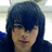 A person with dark hair and bangs appears in four -aligned , each showing a slightly different facial expression or head position against a light background