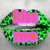 Green lips with pink and orange text reading 'kiss me' on left, transitioning to green lips with red text reading 'through the phone' on right.