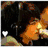 Six distinct pixelated character portraits arranged in a , each with unique clothing and background elements including text overlays