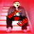 A pixelated figure in a dark robe with red accents sits on steps against a pink background, mouth open in an expression.