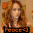 A pixelated image of a person with long curly red hair wearing a white top, displayed in two side-by-side frames showing slight variations.