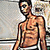 Pixelated image of a shirtless male figure with dark hair, standing against a light gray background.