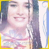 four identical pixelated images showing a person with long dark hair wearing a colorful patterned top against a white background with blue swirls