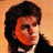 Pixelated close-up of a person with dark hair and light skin wearing a black jacket over a white shirt against an orange background.