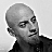 A grayscale animated sequence of a bald man in a dark shirt, with blue pixel marks appearing and changing position across frames.