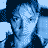 A 3x3 contact sheet of a blue-toned animated icon featuring repeated frames with blurred human faces and a central text block reading "Gothika NOV. 21" on a dark background.