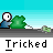 Pixelated cartoon character with white head and blue body stands behind green bush, speaking in speech bubbles while text below reads "Tricked".