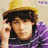 Six distinct views of a person with dark curly hair in various poses, clothing, and settings including a yellow hat, purple striped shirt, microphone, sunglasses, and outdoor background.