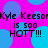 Pixelated text repeats across a bright pink background with blue circles, displaying 'Kyle Keeson is 500 HOT!!!' in black block letters.