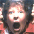 A 50x50 pixel buddy icon split into two sections: a pixelated image of a person with dark hair and an open mouth on the left, and green text reading "Original Icons .com" on a dark green background on the right.