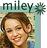 Pixelated image of a smiling person with brown hair, labeled 'miley' above in dark green text on light blue background.