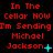 Red pixelated text on black background reads "In The Cellar NOW I'm Sending Michael Jackson" with cyan symbols changing across repeated