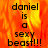 A pixelated text-based image with 'daniel is a sexy beast!!!' over a fiery orange-red background, transitioning to a gray background in the bottom-right corner.