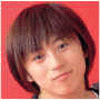A person with short brown hair and bangs appears in with varying background colors and text overlays
