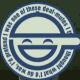 Circular blue-and-white icon with smiling face and text ring, showing subtle horizontal line movement across the face in animation.