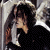 animated frames showing a figure in dark clothing with long hair, transitioning text from 'love' to 'never' to 'dies' across the bottom