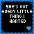 Two side-by-side pixel art with black backgrounds, blue dotted borders, and white text reading "SHE'S GOT EVERY LITTLE THING I WANTED" where the left has a blue heart icon at bottom right and the right has a white heart icon