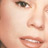 Static close-up of a person's face showing eyes, nose, and mouth with smooth skin tones in a pixelated 48x48 icon format.