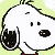 Pixelated cartoon dog with black ears and nose, white face, red collar, smiling expression on light green background.