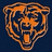 Pixelated orange and brown bear head icon on dark blue background with no visible text or animation.