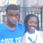 Two people stand side-by-side in a blue and white shirt, with the person on the left wearing a blue shirt that reads "CUTE TV" and the person on the right wearing a white shirt with a blue V-shaped design.