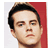 Static 48x48 pixel icon showing a close-up of a person's head and shoulders with dark hair against a red background on the right side and light gray on the left, rendered in low-resolution pixel art style.