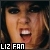 Pixelated close-up of a person's face with mouth open showing teeth, dark hair, and a black rectangular text box with white text reading 'LIZ FAN' at the bottom left.