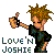Pixelated cartoon character with spiky brown hair giving a thumbs-up gesture, wearing black clothing and standing next to text reading "Love 'N Joshie" on white background.