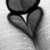 Black-and-white cartoon-style icon with rounded top shape and heart-shaped lower section, showing subtle animation changes across frames.
